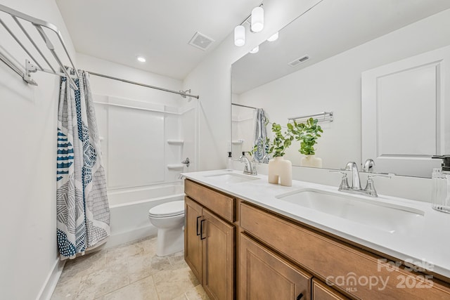 full bathroom featuring toilet, vanity, and shower / bath combination with curtain