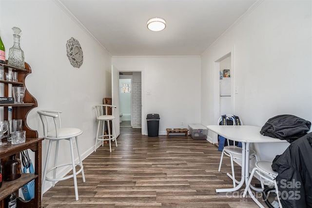 dining room with dark hardwood / wood-style flooring