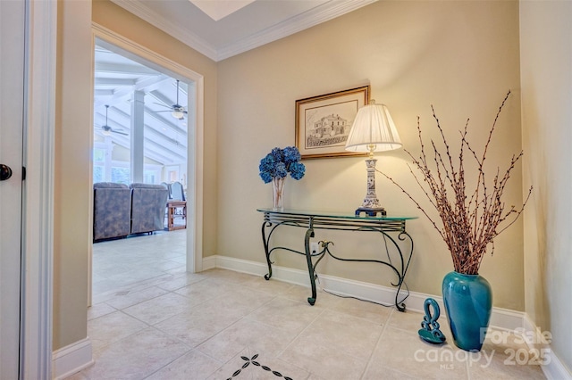 corridor featuring tile patterned floors and crown molding