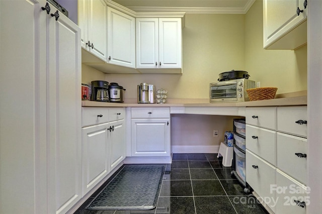 interior space featuring crown molding