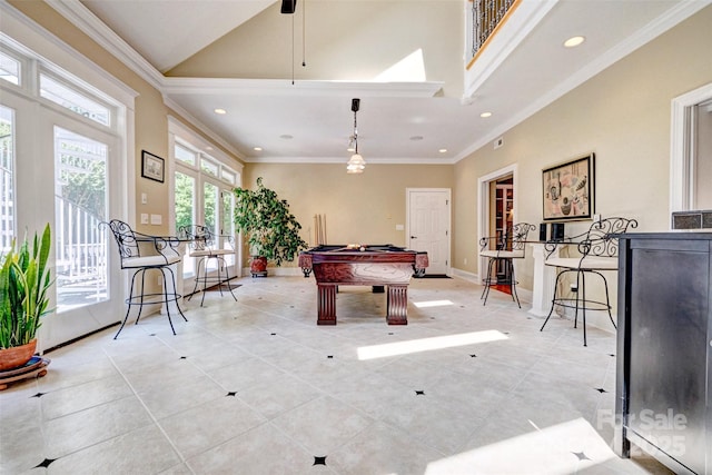 rec room featuring light tile patterned flooring, vaulted ceiling, ornamental molding, and billiards