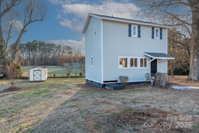 view of front facade with a storage shed