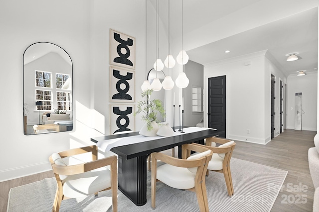 dining area featuring wood-type flooring