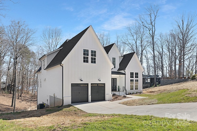 view of side of home featuring a garage