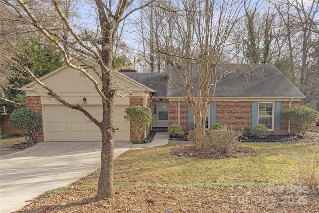 view of front of house featuring a garage and a front lawn