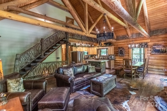 living room featuring log walls, beam ceiling, high vaulted ceiling, and dark wood-type flooring