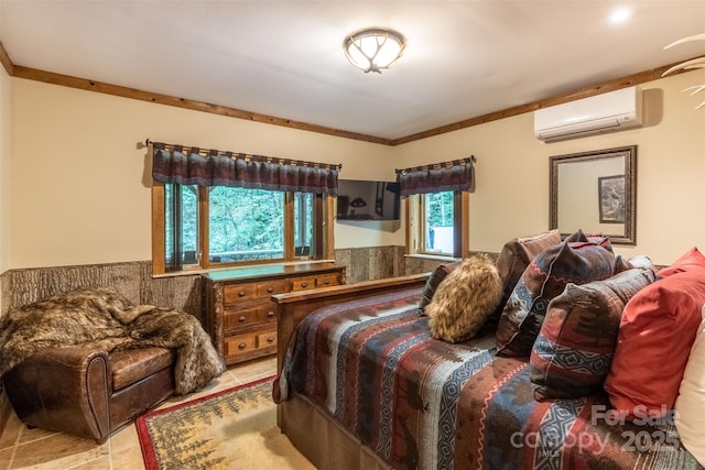 bedroom featuring a wall unit AC and crown molding