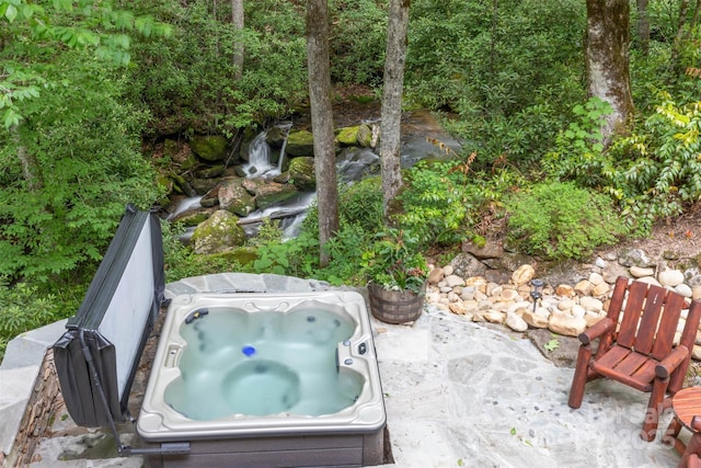 view of patio featuring a hot tub