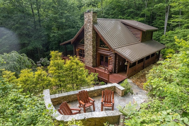 exterior space featuring a wooden deck