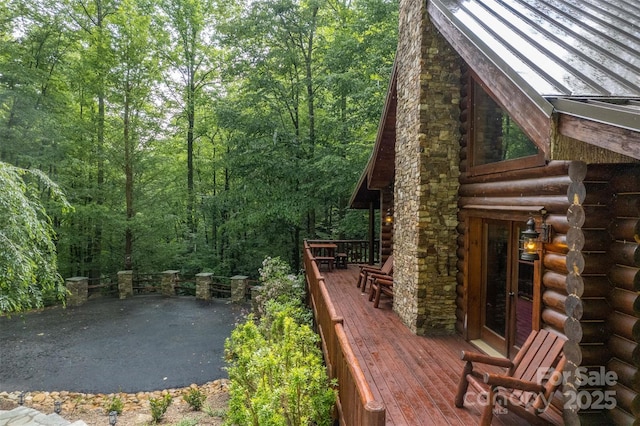 wooden terrace featuring french doors