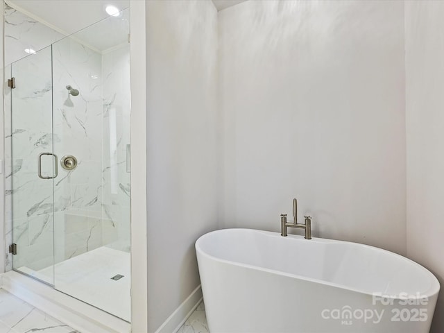 bathroom with separate shower and tub