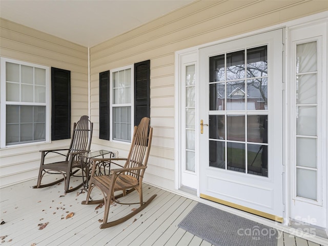 wooden terrace with covered porch