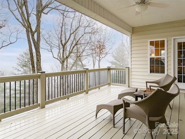 wooden terrace with ceiling fan