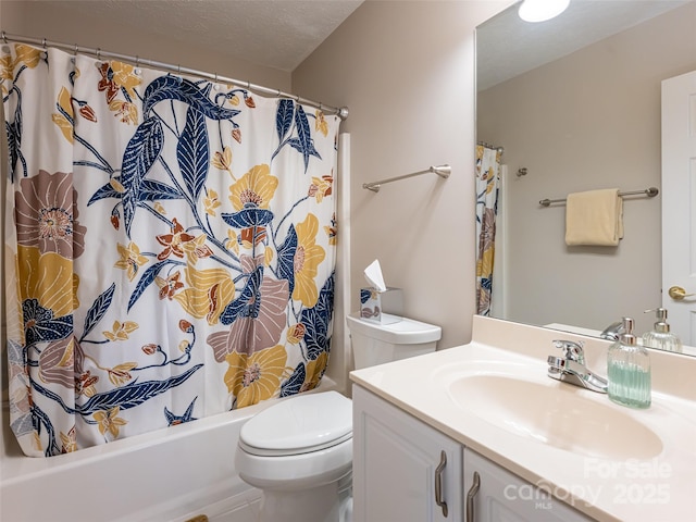 full bathroom featuring vanity, toilet, a textured ceiling, and shower / tub combo with curtain