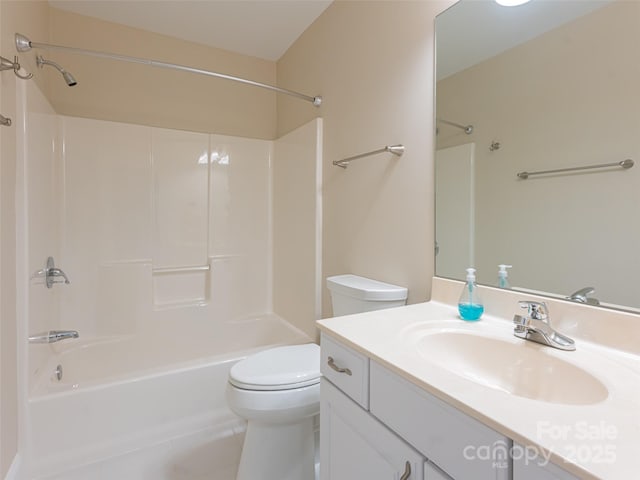 full bathroom with tile patterned floors, shower / washtub combination, vanity, and toilet