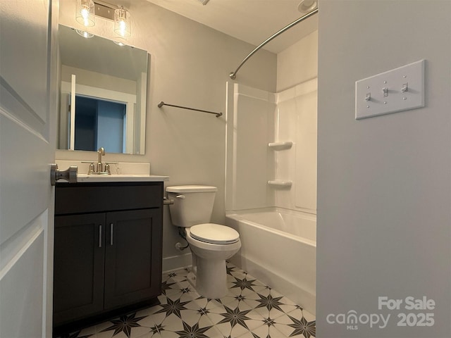 full bathroom featuring washtub / shower combination, vanity, and toilet