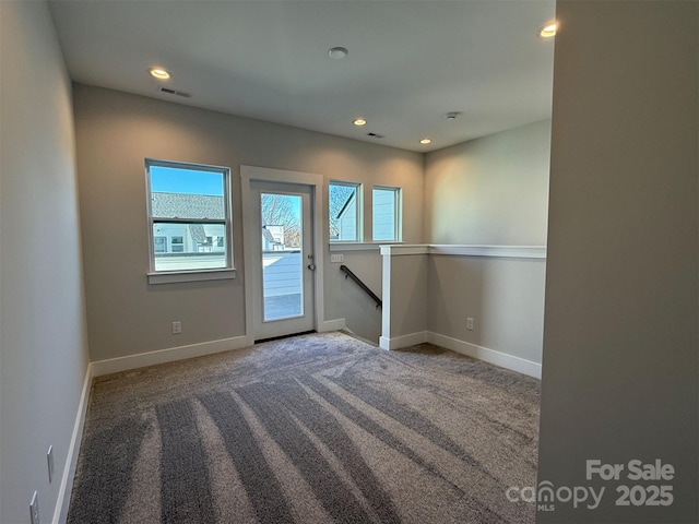 empty room with carpet floors