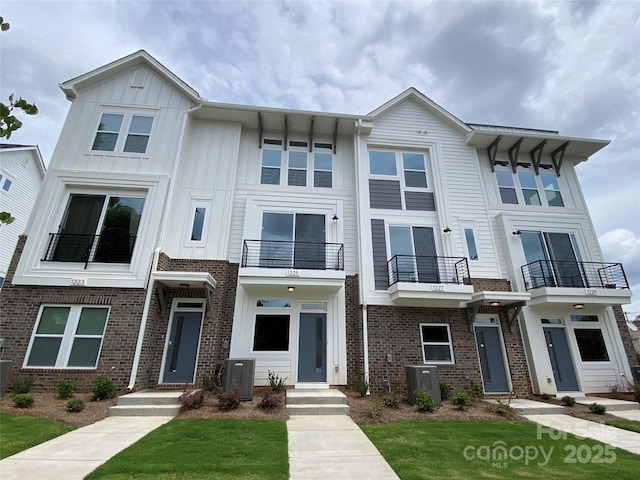 1225 E 34th St Unit Csw0419, Charlotte, NC 28205 - multi unit property with brick siding, board and batten siding, and a balcony