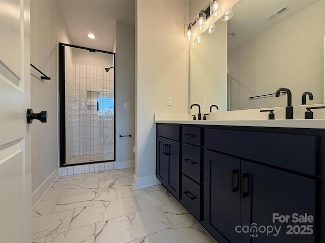 bathroom featuring visible vents, marble finish floor, a shower stall, and baseboards