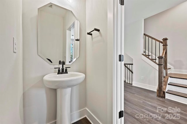 1227 E 34th St Unit Csw0420, Charlotte, NC 28205 - bathroom featuring wood finished floors and baseboards