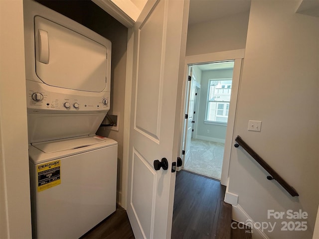 1227 E 34th St Unit Csw0420, Charlotte, NC 28205 - washroom featuring estacked washer and dryer, dark wood-style flooring, and baseboards