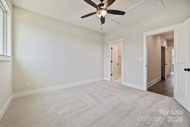 1227 E 34th St Unit Csw0420, Charlotte, NC 28205 - unfurnished bedroom with attic access, carpet floors, baseboards, and a ceiling fan