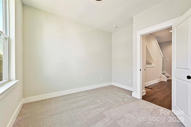 1227 E 34th St Unit Csw0420, Charlotte, NC 28205 - empty room with carpet floors and baseboards