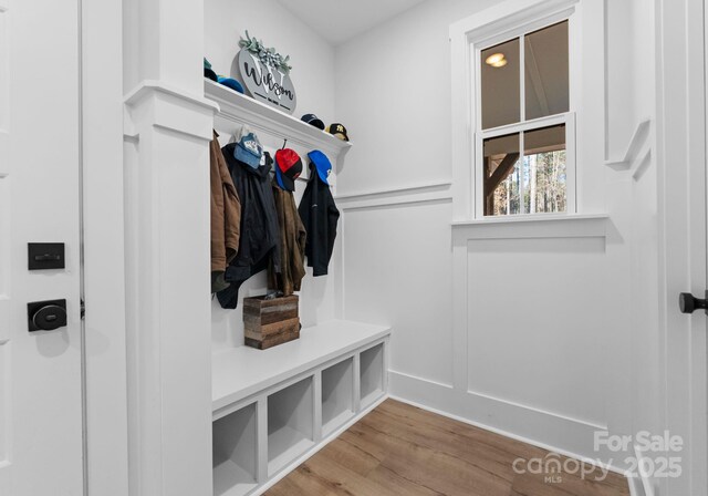 mudroom with hardwood / wood-style flooring