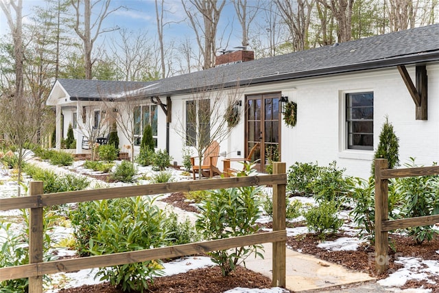 view of snow covered property