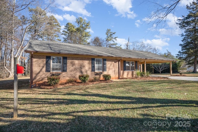 ranch-style home featuring a front yard