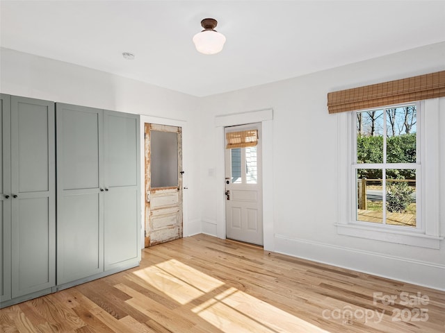 unfurnished bedroom featuring light hardwood / wood-style floors