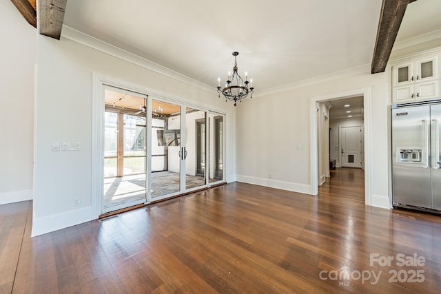 unfurnished dining area featuring an inviting chandelier, crown molding, and dark wood-type flooring