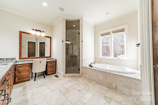 bathroom featuring crown molding, vanity, and shower with separate bathtub