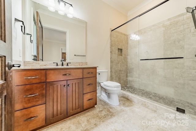 bathroom with a shower with door, vanity, ornamental molding, and toilet