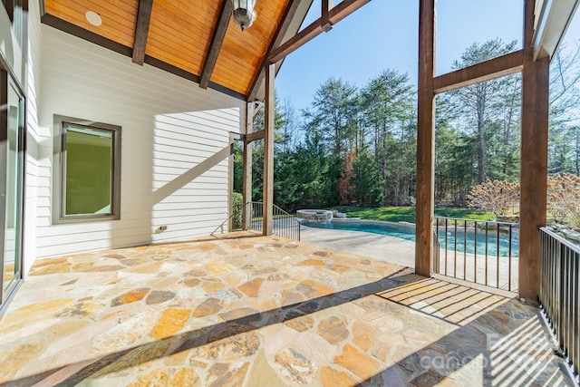 view of patio with a pool with hot tub