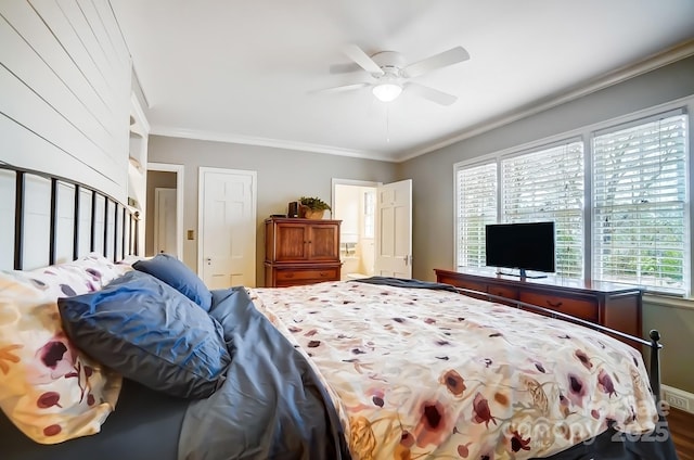 bedroom with ceiling fan and crown molding