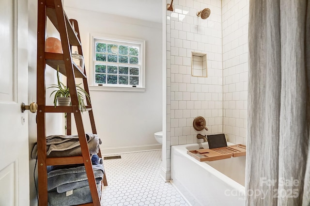 bathroom with shower / bath combination with curtain and toilet