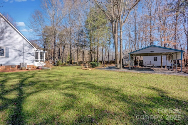 view of yard with cooling unit and a carport