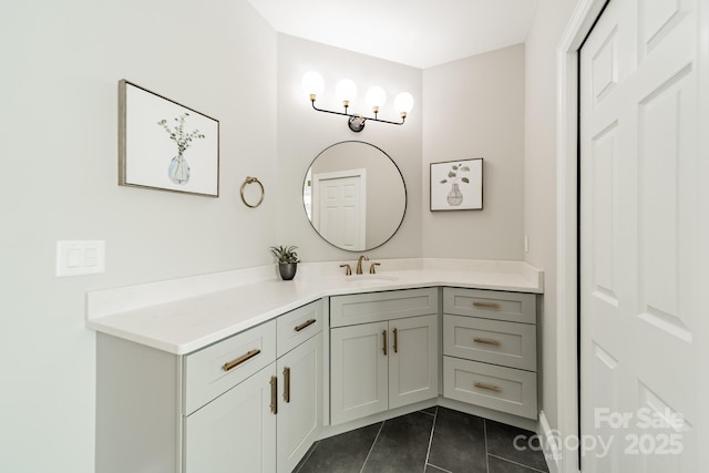 bathroom with tile patterned flooring and vanity