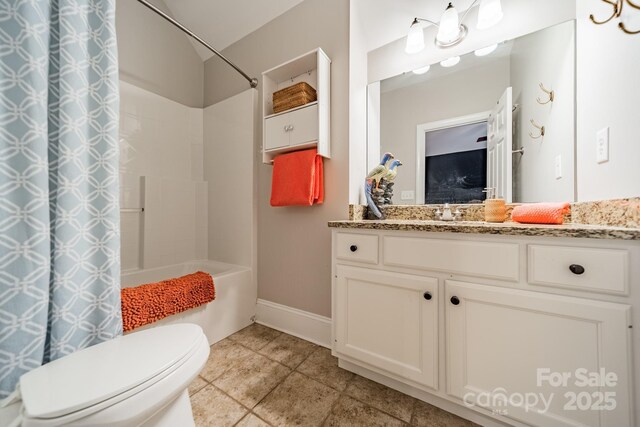 full bathroom with shower / tub combo with curtain, vanity, and toilet