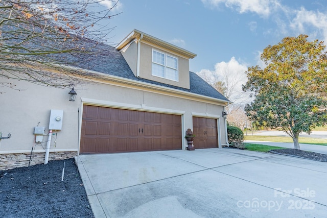 view of home's exterior with a garage