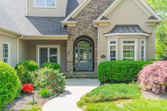 4150 Summit Ridge Ln, Denver, NC 28037 - doorway to property featuring stucco siding, stone siding, and a shingled roof