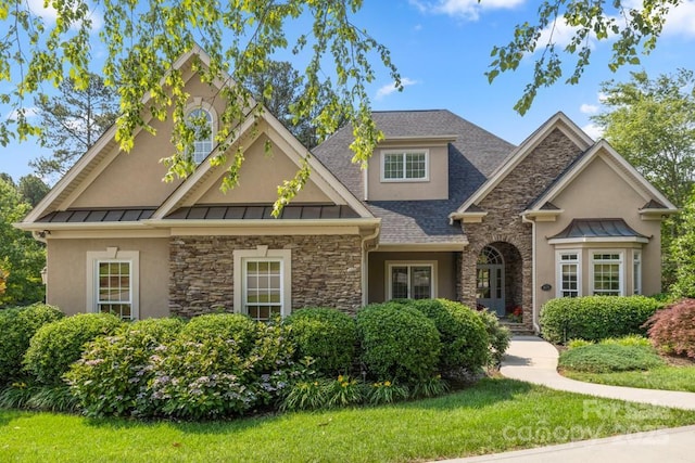 4150 Summit Ridge Ln, Denver, NC 28037 - view of front of property featuring stone siding, a standing seam roof, and stucco siding