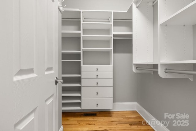 4150 Summit Ridge Ln, Denver, NC 28037 - walk in closet with wood finished floors