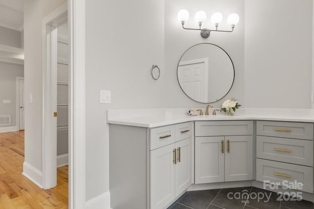 4150 Summit Ridge Ln, Denver, NC 28037 - bathroom with vanity, wood finished floors, and baseboards