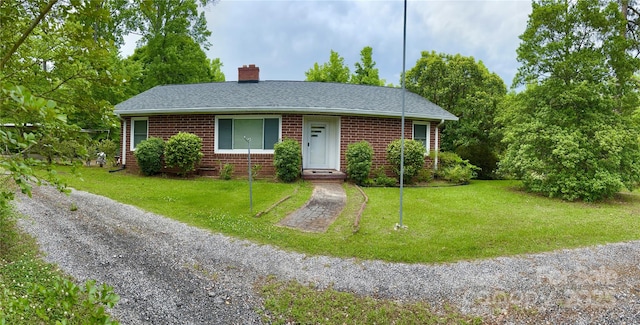 view of front of property with a front lawn