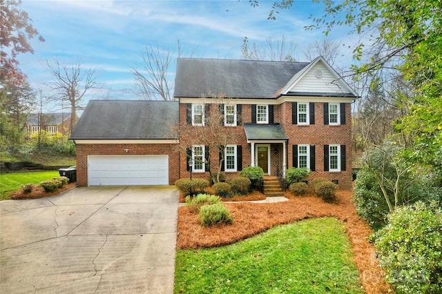 colonial inspired home with a garage