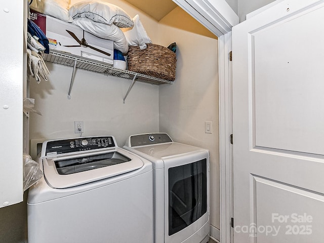 laundry room with washer and clothes dryer