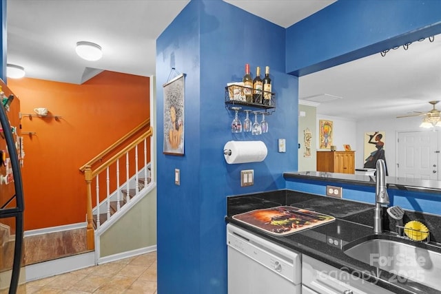 kitchen with dishwasher, ceiling fan, light tile patterned flooring, and sink