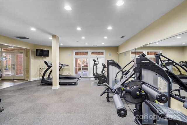 exercise room featuring french doors